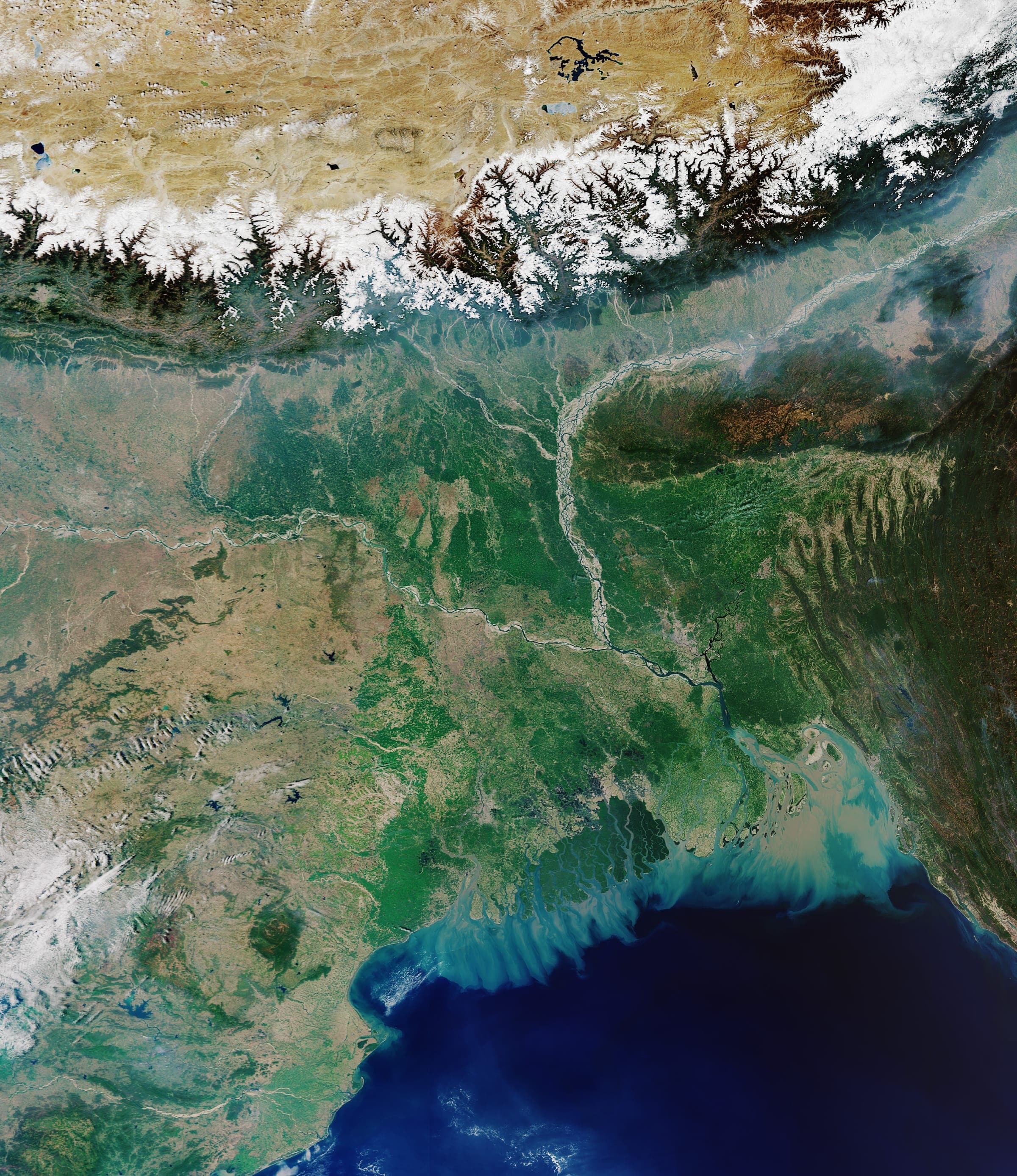 Satellite view of the Ganges–Brahmaputra delta and the green mass of the Sundarbans